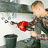 Прочистка канализационных труб тросом Rothenberger ROSPIMATIC